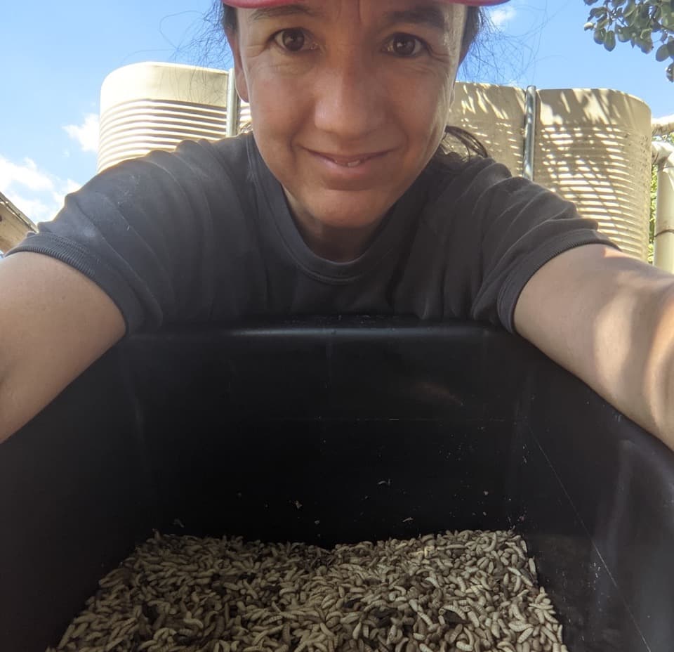 Image of J holding protein tub